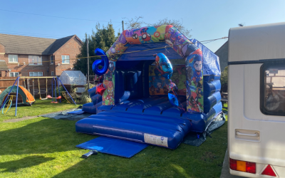 Blue Superhero Side Slide Bouncy Castle