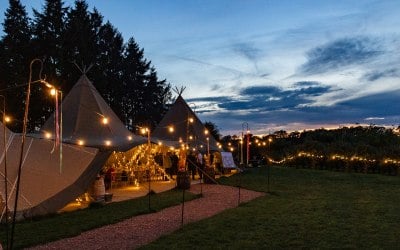 Triple hat tipi at dusk