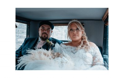 Mr & Mrs Hatch in their traditional transport heading to their wedding reception