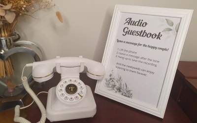 White Retro Audio Guestbook phone with a white frame.