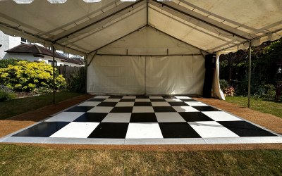 Plain marquee with Black and White dancefloor